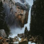 River Stream Between Rocks During Daytime