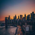 Scenic Road with Vehicles Near Buildings