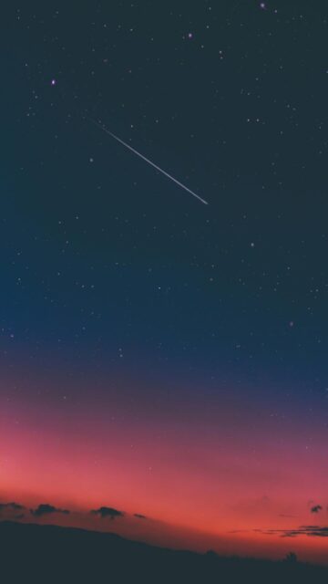 Shooting Star in Night Sky