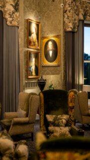Framed Portraits on Patterned Wall