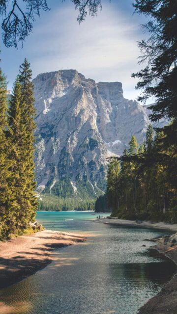 Breathtaking White Mountain Landscape Near Body of Water