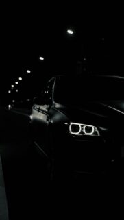 Black BMW M5 at Night