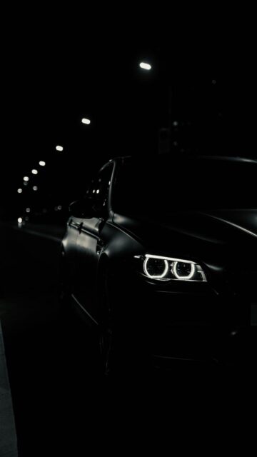 Black BMW M5 at Night