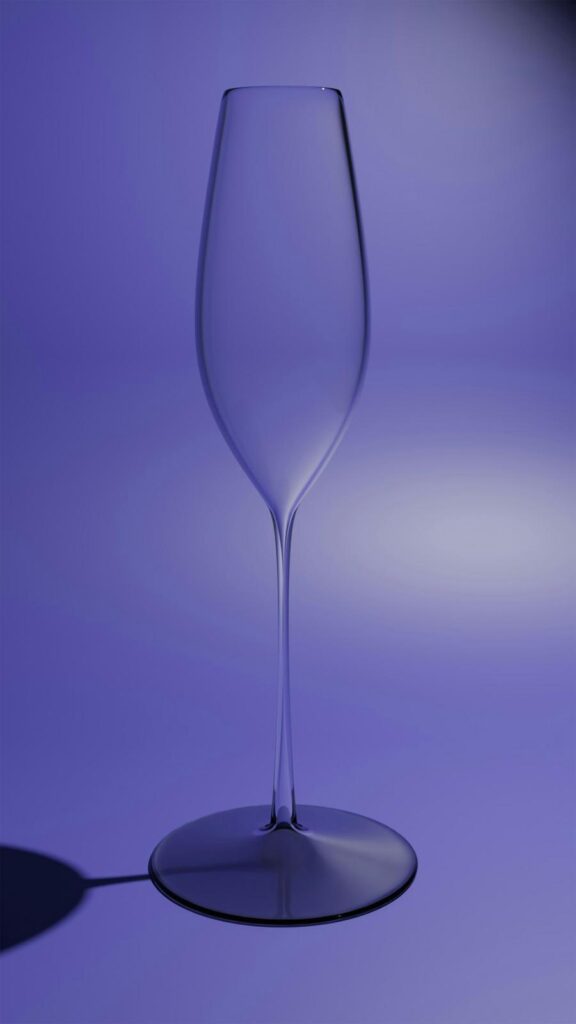 Clear Champagne Flute on Purple Background