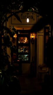 Nighttime Bar Entrance Mobile Wallpaper