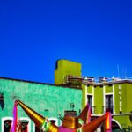 Vibrant Piñata in Front of Buildings