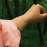 Nature-Inspired Tattoo in Forest Landscape