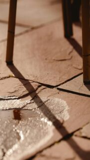 Nature’s Reflection – Puddle on Stone Patio