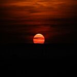 vibrant-sunset-with-orange-clouds-mobile-wallpaper