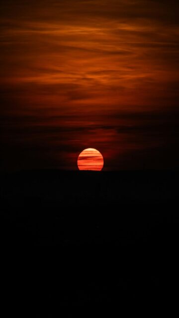 vibrant-sunset-with-orange-clouds-mobile-wallpaper