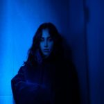 Serene Woman in Blue Light