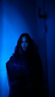 Serene Woman in Blue Light