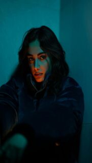 Dark Hair Illuminated by Blue Light
