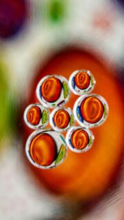 Vibrant Swirls with Water Droplets – Mobile Wallpaper