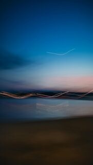Dusk Light Trails Over Water