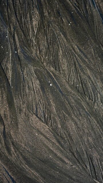 Abstract Dark Wet Sand Patterns
