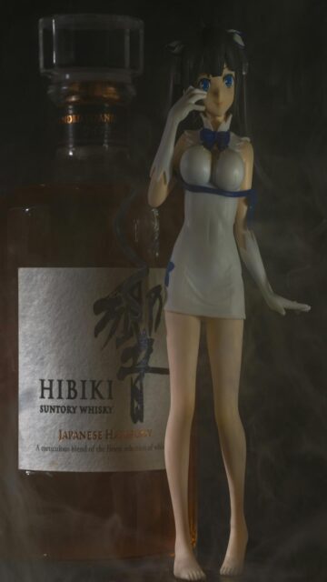Whiskey and Anime Figure Mobile Wallpaper
