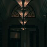 Elegant Art Deco Hallway with Ornate Chandeliers