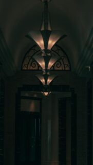 Elegant Art Deco Hallway with Ornate Chandeliers