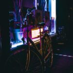 Nighttime Delight: Bright Food Cart and Bike