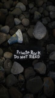 Private Rock Wallpaper – Black Background with White Text