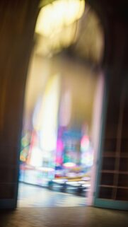 Blurred Colorful Lights Through Archway – Mobile Wallpaper