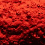 Vibrant Red Liquid with Bubbles