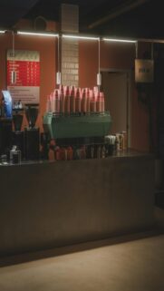 Coffee Shop Counter With Espresso Machine And Cups