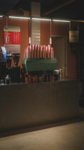 Coffee Shop Counter With Espresso Machine And Cups