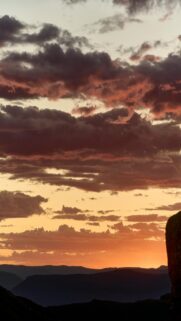 Dramatic Sunset Sky Over Silhouetted Mountains – Mobile Wallpaper