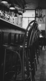 Urban Vibes: Empty Bar Stools at Night