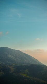 Breathtaking Blue Sky View from Green Mountainside