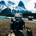 Snowy Mountains Landscape with Instant Camera
