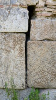 Rustic Nature: Weathered Stone Wall with Greenery