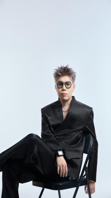 Sleek Businessman on Chair