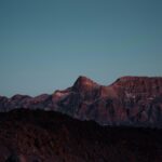 Mountain Range at Dusk with Clear Blue Sky