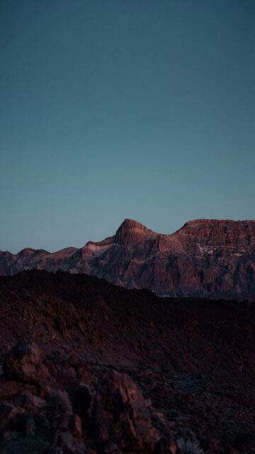 Mountain Range at Dusk with Clear Blue Sky