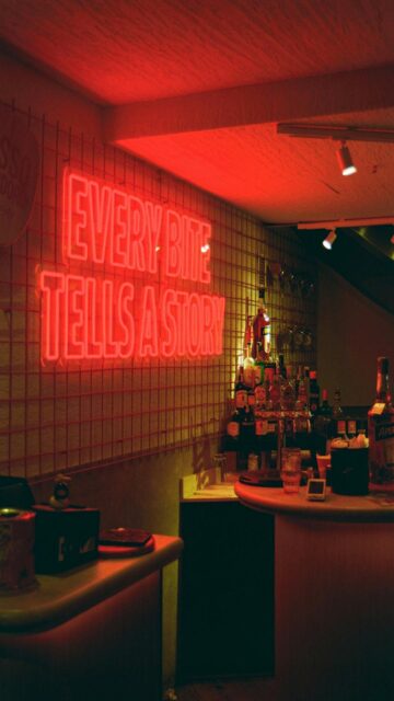 Every Bite Tells A Story - Neon Sign Wallpaper