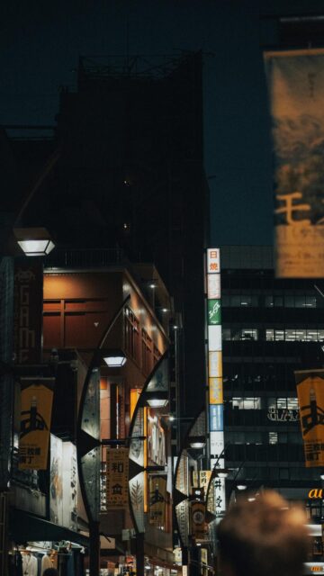 Neon Nights: Busy Street Illuminated