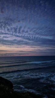Ocean Waves at Dusk with Dramatic Clouds
