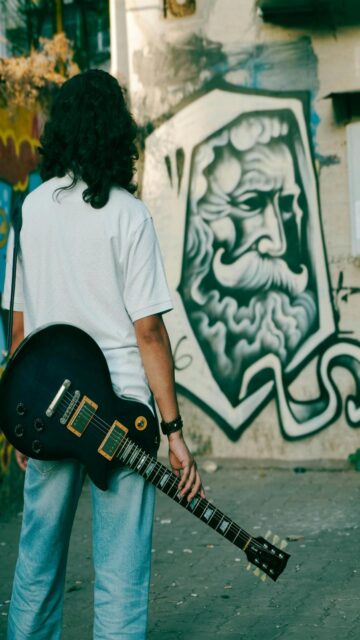 Guitarist in Urban Oasis