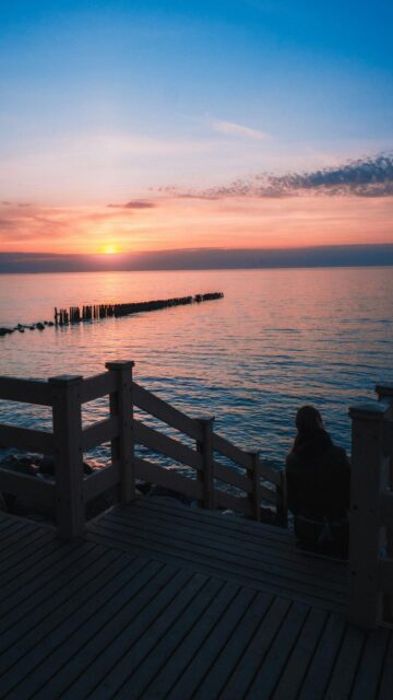 Sunset Over The Calm Ocean