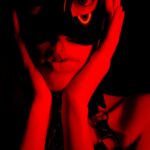 Mysterious Figure with Red Lighting