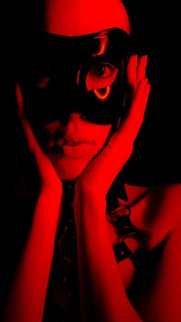 Mysterious Figure with Red Lighting