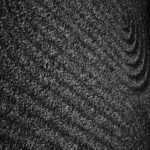 Raked Sand With Swirling Patterns In Black And White