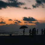 Sunset Silhouettes on Beach
