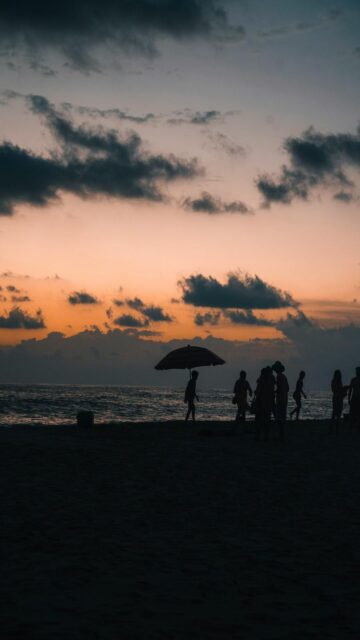 Sunset Silhouettes on Beach