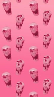 Sweet Treat: Strawberry Milkshakes with Hearts on Pink Background