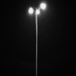 Winter Night Magic: Streetlight Illuminates Falling Snow