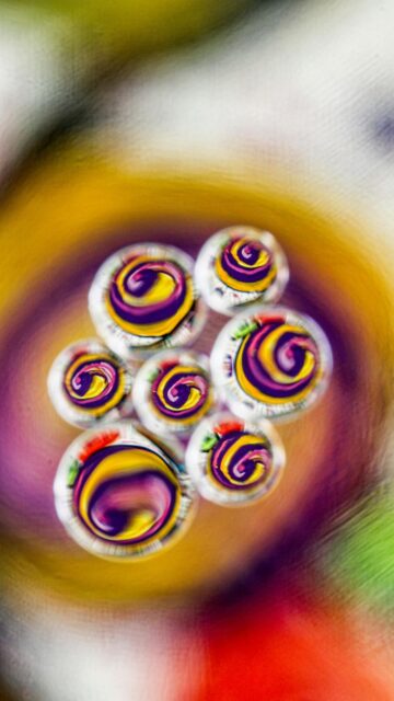 Whimsical Droplet Designs with Purple and Yellow Centers